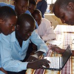 Sharing stories in an African classroom. Photo by Bonny Norton.
